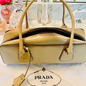 100% Auth Prada tan leather bag w/ brown piping